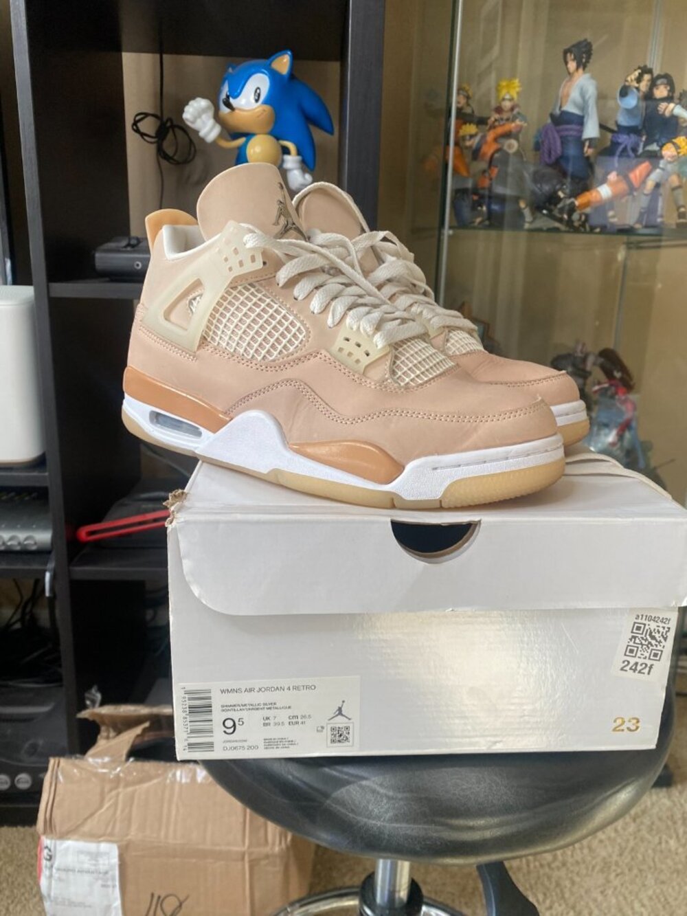 Size 9.5 - Air Jordan 4 Retro Shimmer W